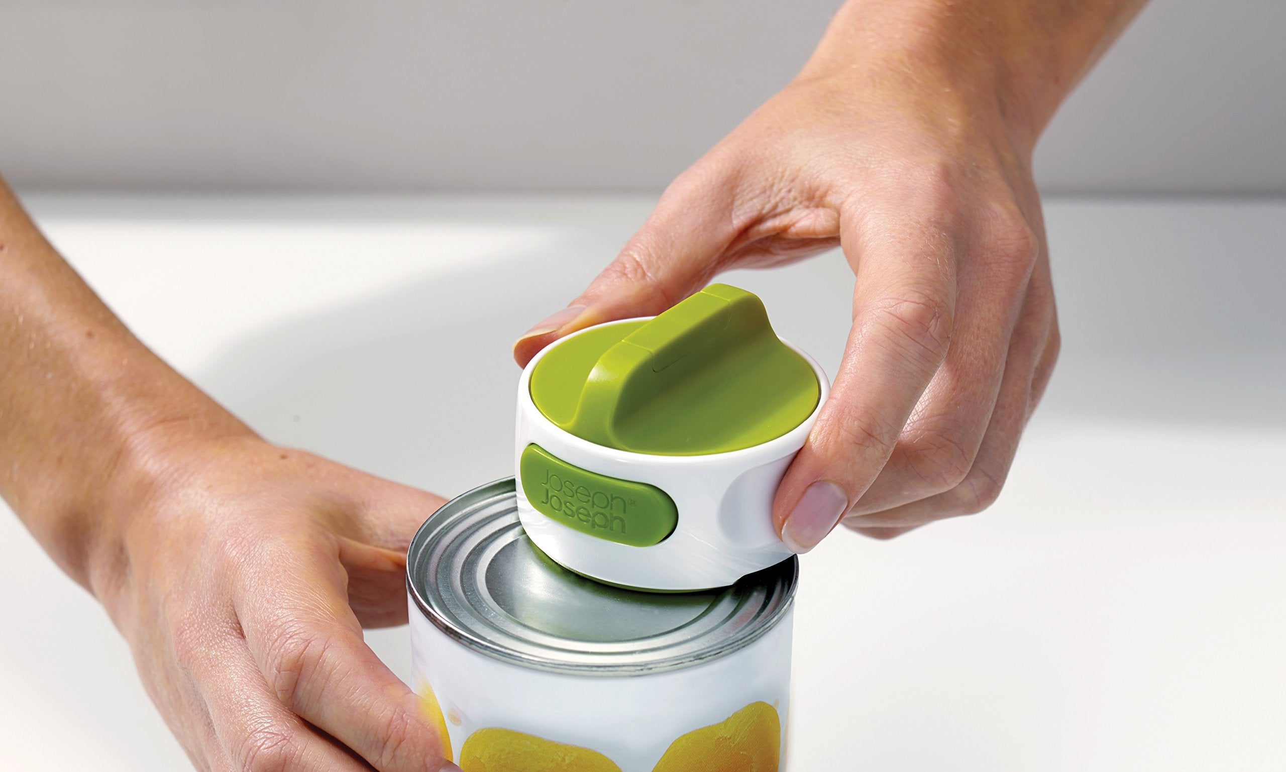 Joseph Joseph Can-Do Compact Can Opener - Space-Saving Circular Design | White/Green Plastic 4